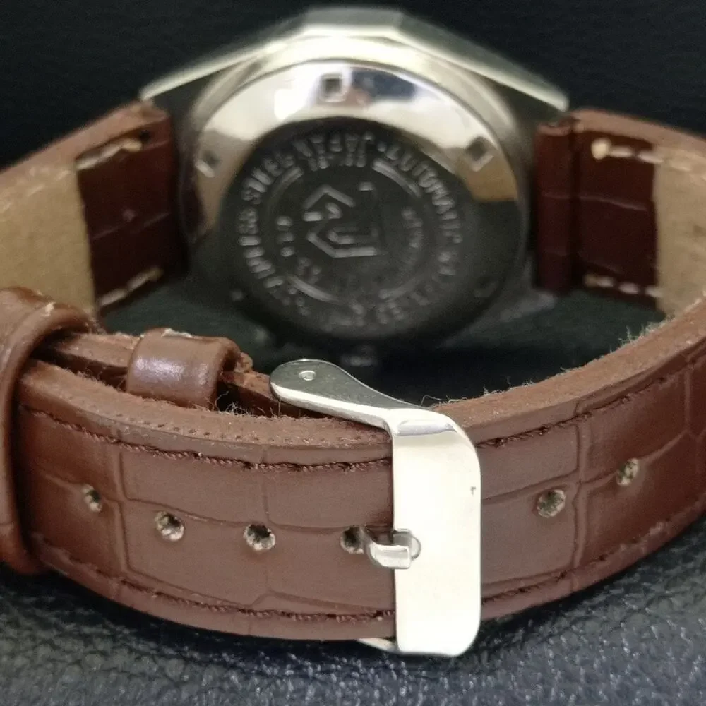 Vintage 1985 Ricoh Automatic Mens Silver Watch W/daydate & Gold accents
